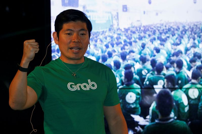 &copy; Reuters. FILE PHOTO: FILE PHOTO: Grab&apos;s CEO Anthony Tan speaks during Grab&apos;s fifth anniversary news conference in Singapore