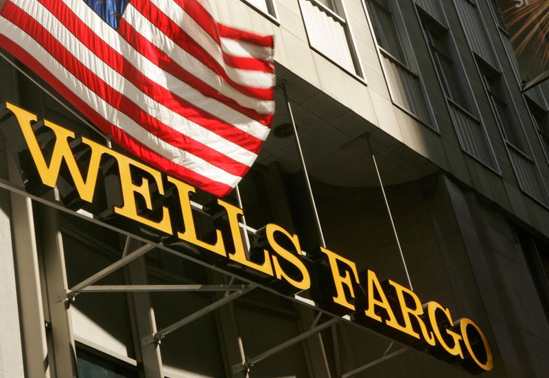 &copy; Reuters. A U.S. flag flies above Wells Fargo &amp; Co headquarters in San Francisco