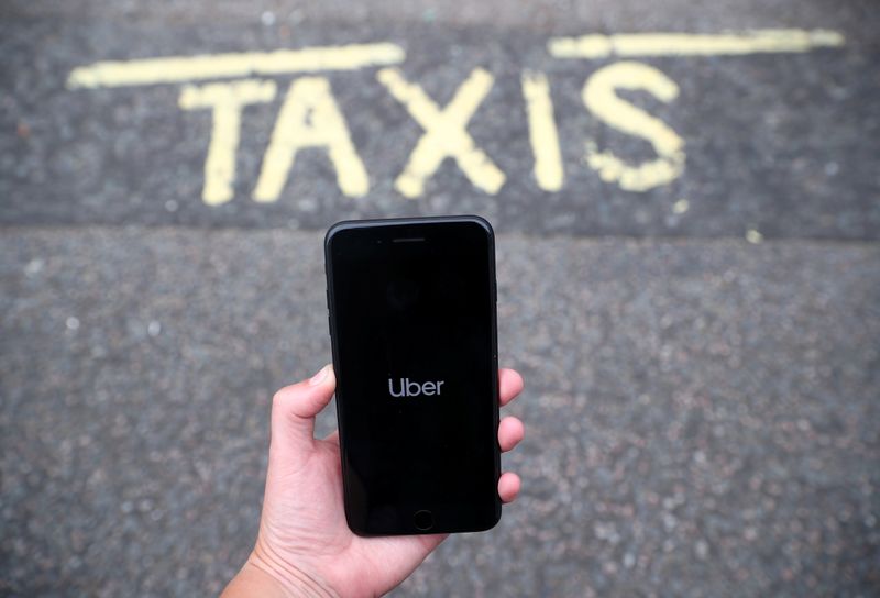 &copy; Reuters. The Uber application is seen on a mobile phone in London