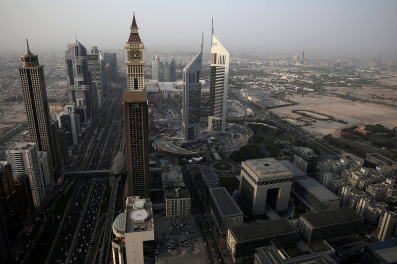 &copy; Reuters. FILE PHOTO: A general view of Dubai International Financial Centre (DIFC) (R) among high-rise towers in Dubai