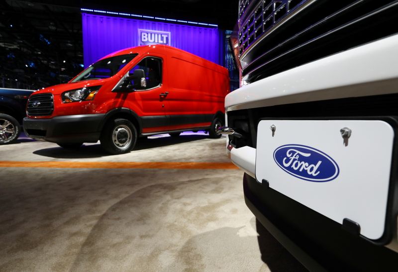 © Reuters. FILE PHOTO: Ford trucks displayed at the North American International Auto Show in Detroit, Michigan