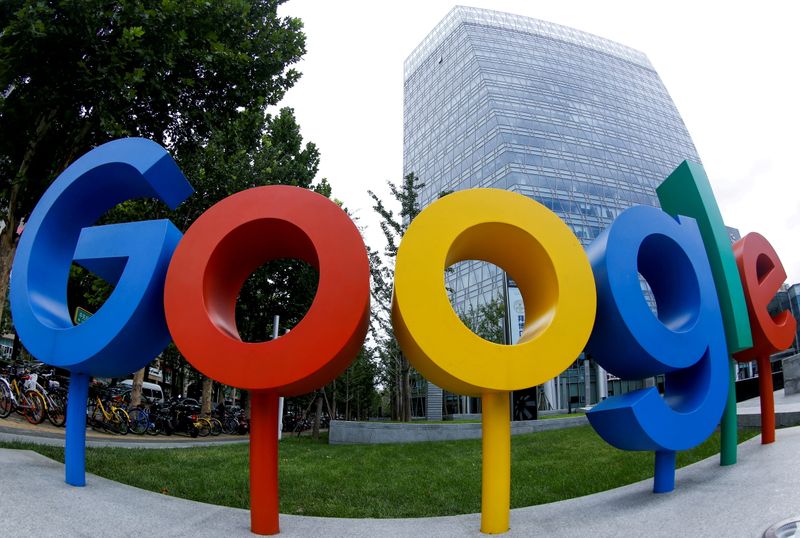 © Reuters. FILE PHOTO: The brand logo of Alphabet Inc's Google is seen outside its office in Beijing