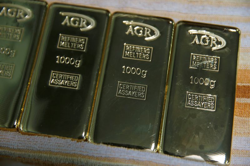&copy; Reuters. Gold bars weighing 1kg are seen at AGR (African Gold Refinery) in Entebbe