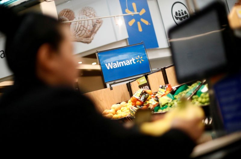 &copy; Reuters. FILE PHOTO: A customer shops inside a Walmart store in Mexico City