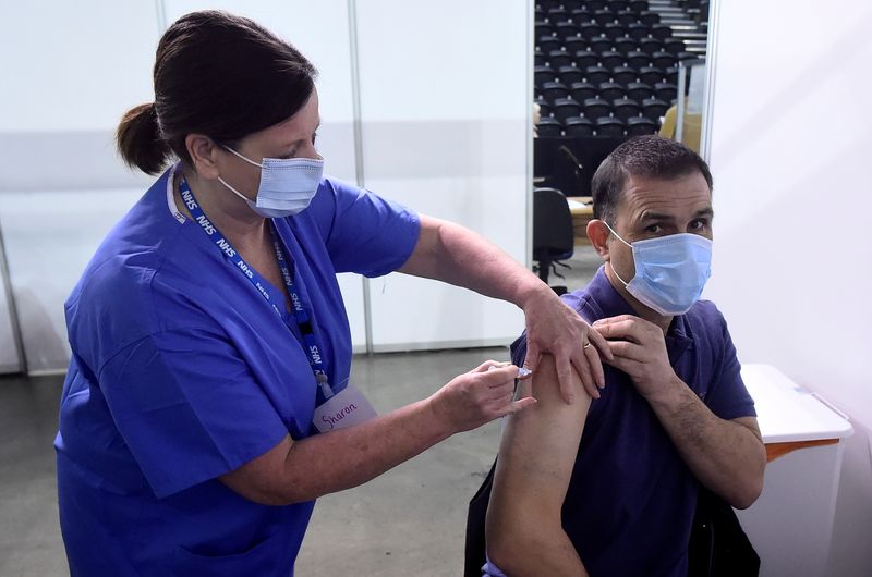 &copy; Reuters. COVID-19 vaccinations at Belfast&apos;s SSE Arena