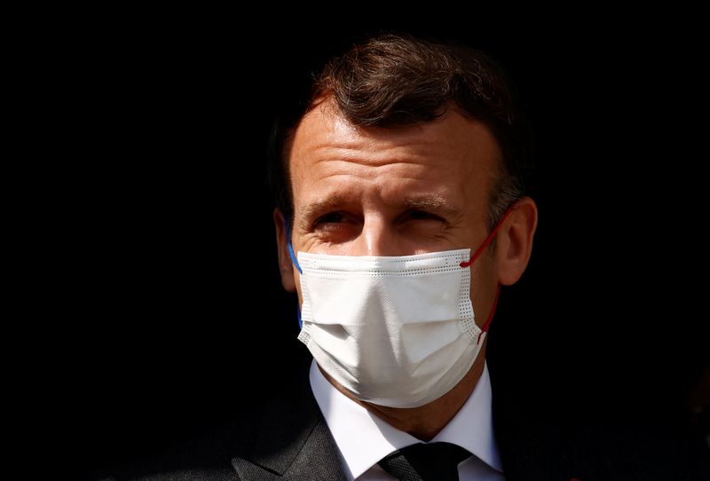 &copy; Reuters. French President Macron visits a child psychiatry department at Reims hospital