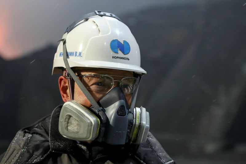 &copy; Reuters. An employee wears a safety helmet at a metallurgical workshop of Kola Mining and Metallurgical Company in Monchegorsk
