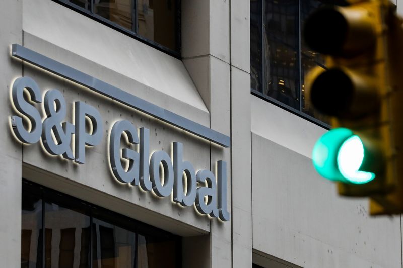 &copy; Reuters. The S&amp;P Global logo is displayed on its offices in the financial district in New York