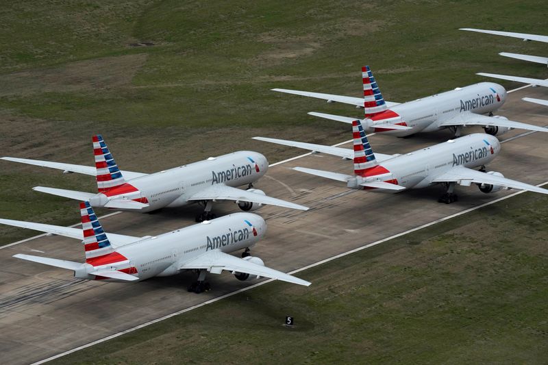 &copy; Reuters. FILE PHOTO: American Airlines passenger planes crowd a runway where they are parked due to flight reductions to slow the spread of coronavirus disease (COVID-19), at Tulsa International Airport in Tulsa