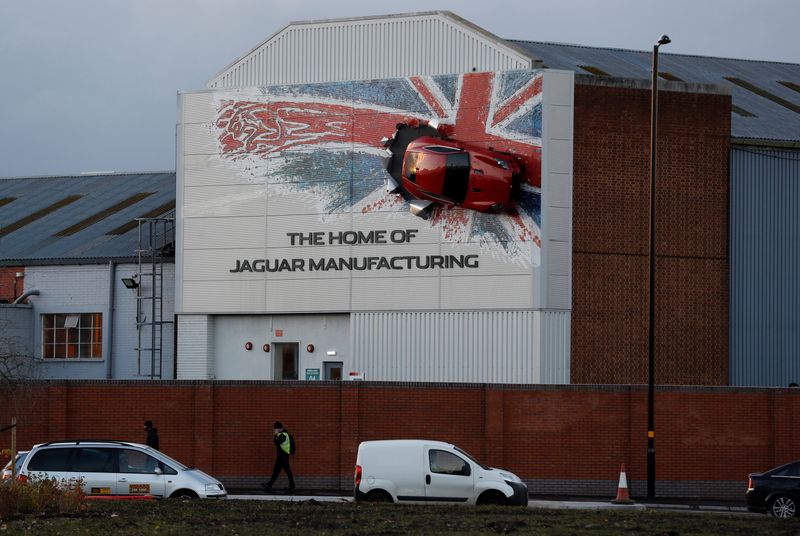 &copy; Reuters. A car hangs on the wall of Jaguar&apos;s Castle Bromwich manufacturing facility in Birmingham