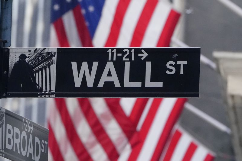 Wall St. opens flat as earnings roll in; jobless claims fall