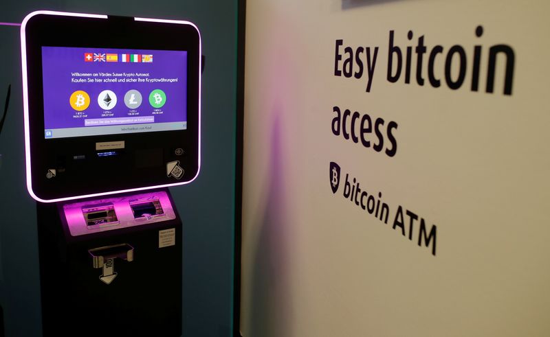 &copy; Reuters. The exchange rates of Bitcoin, Ether, Litecoin and Bitcoin Cash are seen on the display of a cryptocurrency ATM at the headquarters of Swiss Falcon Private Bank in Zurich