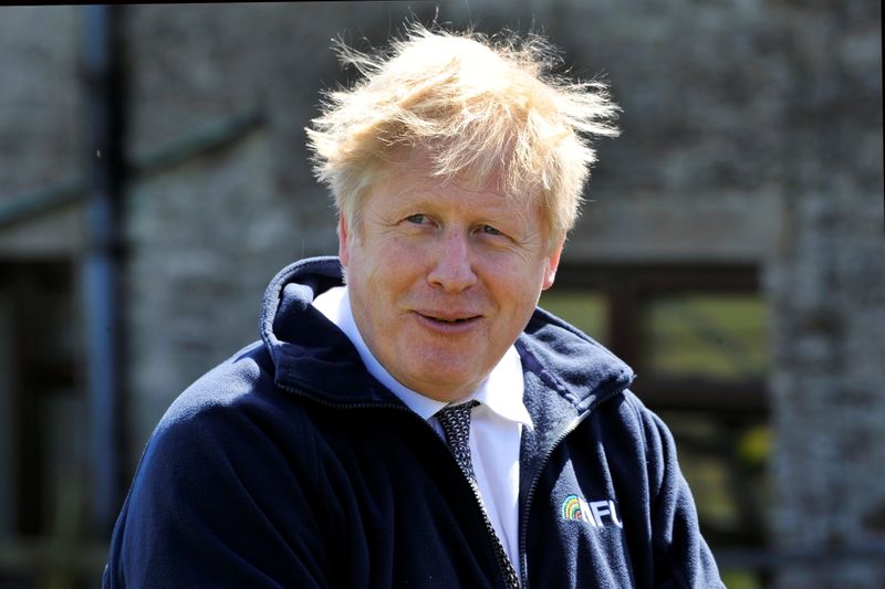&copy; Reuters. Britain&apos;s Prime Minister Boris Johnson visits Moor Farm in Stoney Middleton