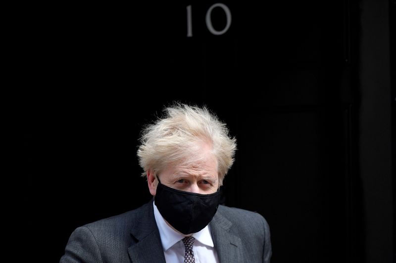 &copy; Reuters. FILE PHOTO: Britain&apos;s Prime Minister Boris Johnson leaves Downing Street in London