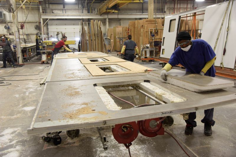 &copy; Reuters. Employees work at a REV plant where they produce recreational vehicles in Decatur