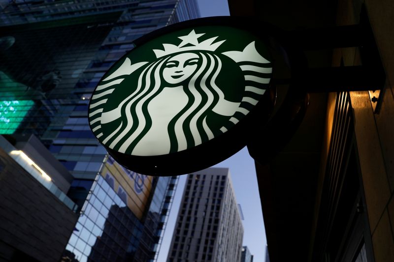 &copy; Reuters. FILE PHOTO: A Starbucks sign is shown on one of the company&apos;s stores in Los Angeles