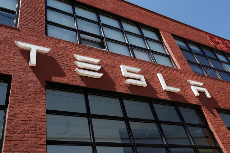 &copy; Reuters. The TESLA logo is seen outside a dealership in the Brooklyn borough of New York City