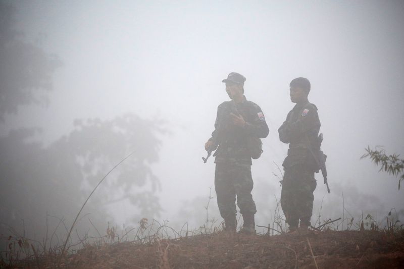 &copy; Reuters. FILE PHOTO: Soldiers of Karen National Union (KNU) stand guard during the 70th anniversary of Karen National Revolution Day in Kaw Thoo Lei