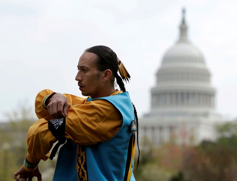 &copy; Reuters. FILE PHOTO: Native American Jeff Horinek, a member of the Cowboys and Indian Alliance, participates in protests against the Keystone XL pipeline in front of the U.S. Capitol in Washington