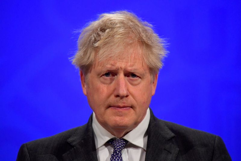 &copy; Reuters. FILE PHOTO: Britain&apos;s PM Johnson holds a news conference, in London