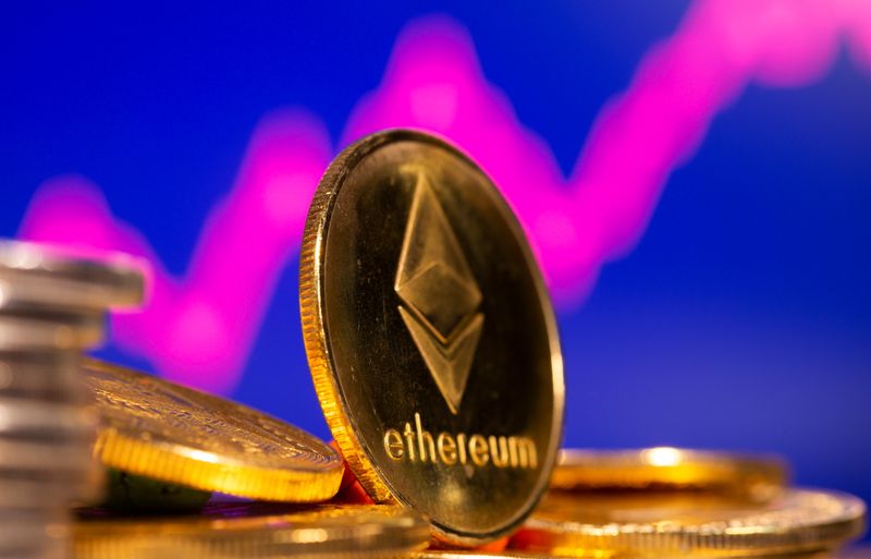 &copy; Reuters. A representation of virtual currency Ethereum are seen in front of a stock graph in this illustration