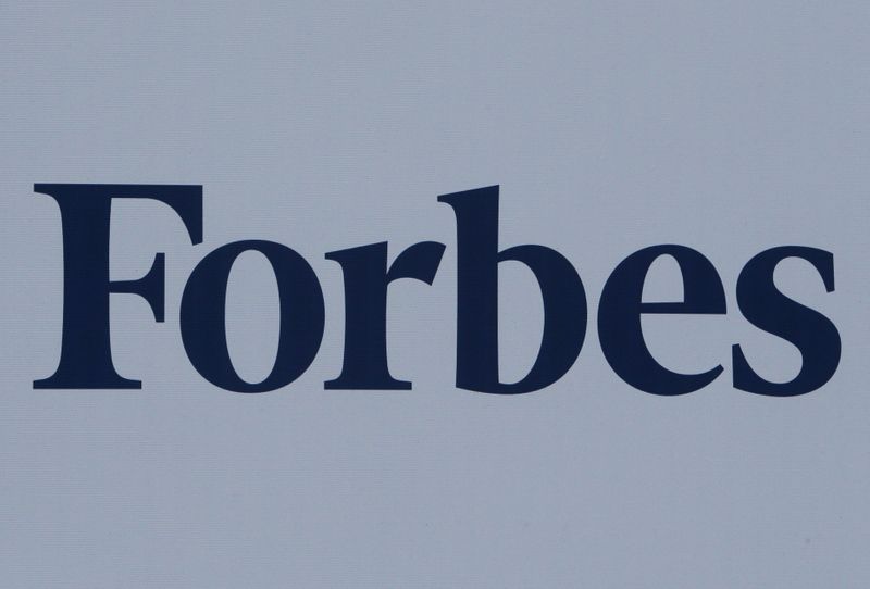 &copy; Reuters. FILE PHOTO: The logo of Forbes magazine is seen on a board in 2017