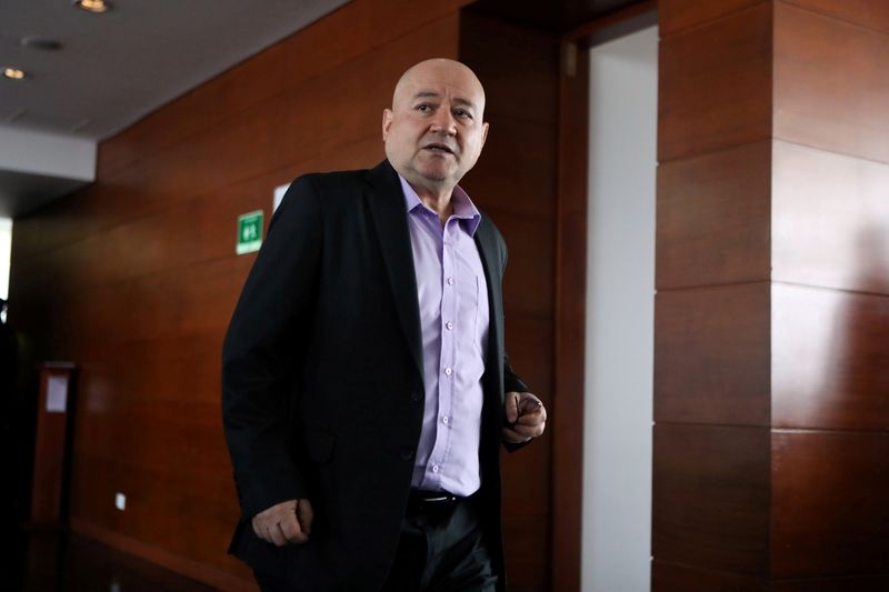 &copy; Reuters. FILE PHOTO: Carlos Antonio Lozada arrives for a hearing at JEP tribunal in Bogota