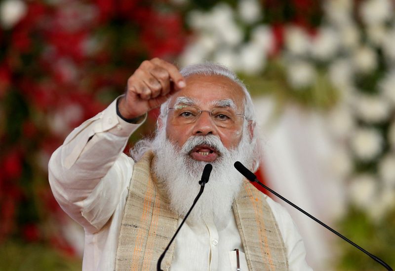 &copy; Reuters. FILE PHOTO: India&apos;s PM Modi addresses a gathering before flagging off the &quot;Dandi March&quot;, in Ahmedabad