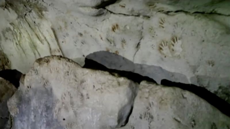 &copy; Reuters. Hand prints, reportedly 1,200 years old, are seen on the cave walls, in Merida