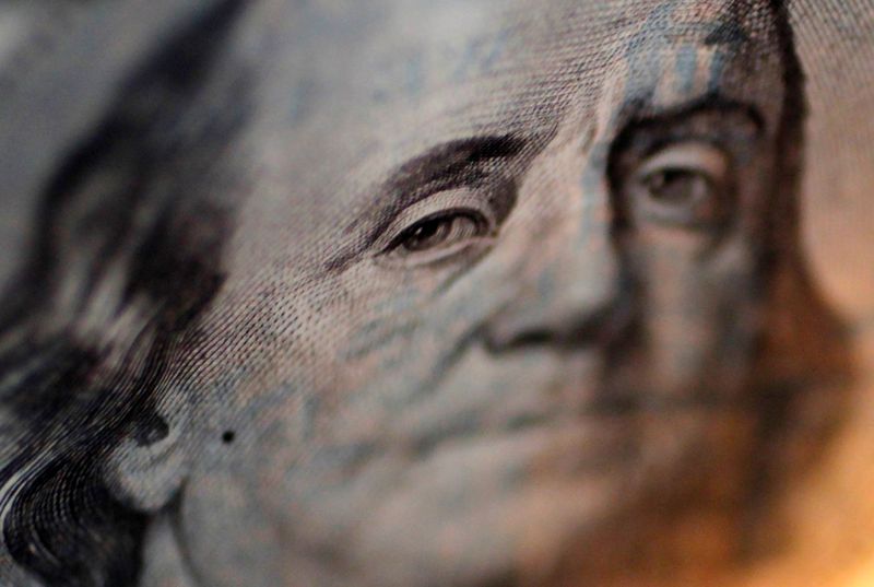 &copy; Reuters. A portrait of Benjamin Franklin on a U.S. One-hundred dollar bill is pictured at Interbank Inc. money exchange in Tokyo