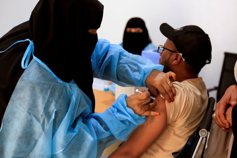 &copy; Reuters. A man receives the AstraZeneca vaccine, at a medical center in Taiz
