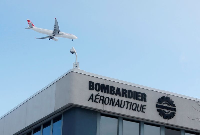 &copy; Reuters. A plane flies over a Bombardier plant in Montreal