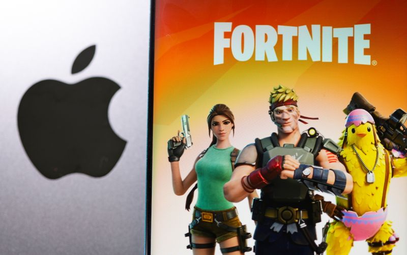 &copy; Reuters. FILE PHOTO: Fortnite game graphic is displayed on a smartphone in front of Apple logo in this illustration taken, May 2, 2021. REUTERS/Dado Ruvic/Illustration