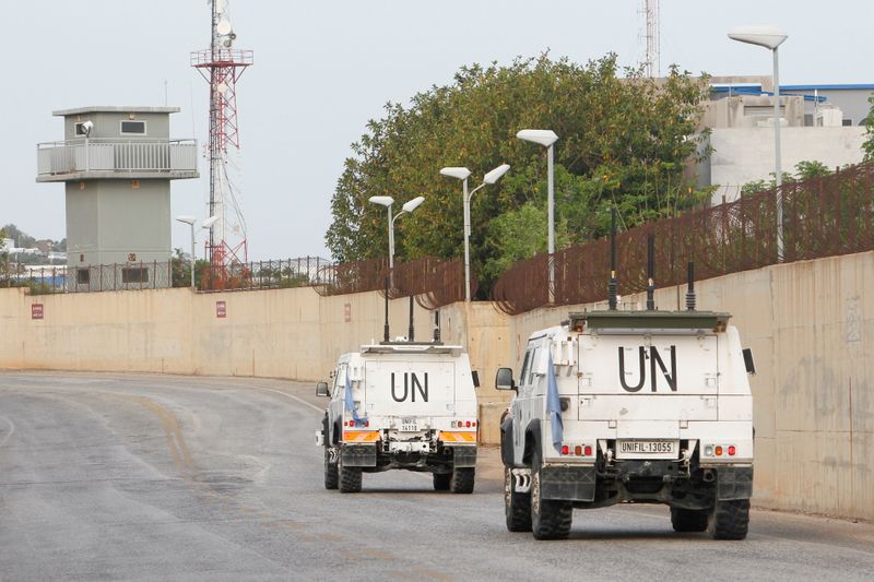 &copy; Reuters. UN peacekeepers (UNIFIL) vehicles drive in Naqoura, near the Lebanese-Israeli border