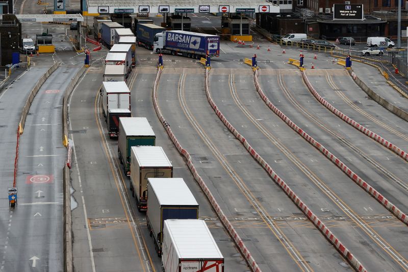 &copy; Reuters. FILE PHOTO: Lorries queue in at the border control of the Port of Dover, following the end of the Brexit transition period, in Dover, Britain, January 15, 2021. REUTERS/John Sibley