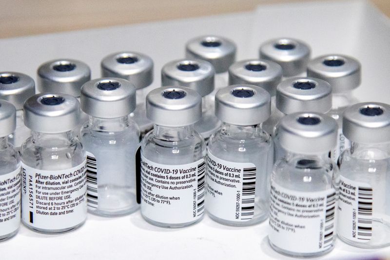 &copy; Reuters. FILE PHOTO: Empty vials of the Pfizer-BioNTech coronavirus disease (COVID-19) vaccine are seen at The Michener Institute, in Toronto, Canada January 4, 2021. REUTERS/Carlos Osorio