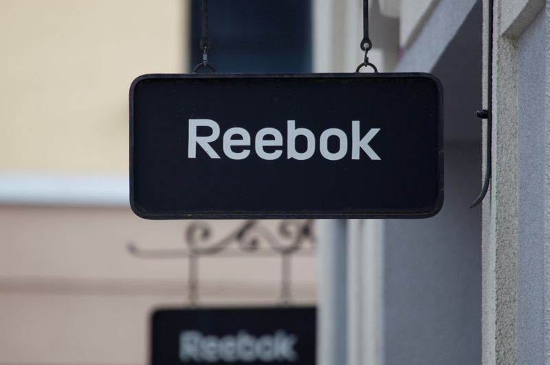 &copy; Reuters. FILE PHOTO: Boards with Reebok store logo are seen on a shopping center at the outlet village Belaya Dacha outside Moscow