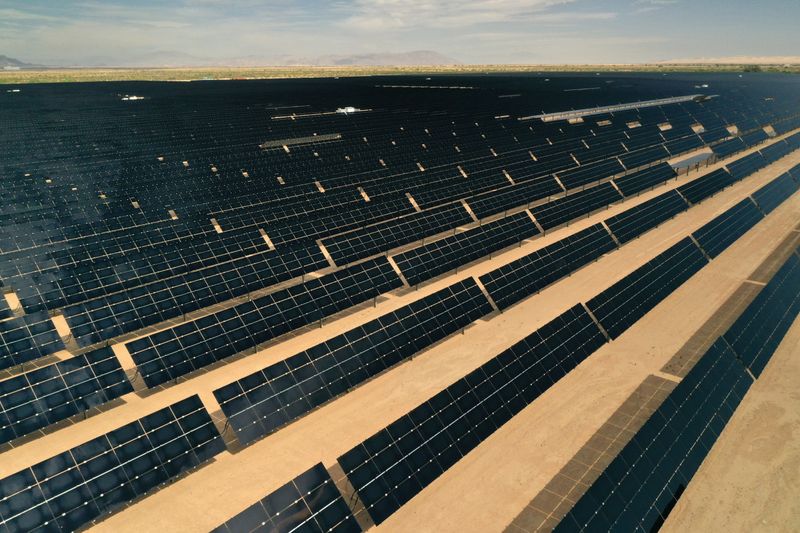 &copy; Reuters. FILE PHOTO: Arrays of photovoltaic solar panels are seen at the Tenaska Imperial Solar Energy Center South in this aerial photo taken over El Centro, California, U.S., May 29, 2020. Picture taken with a drone. REUTERS/Bing Guan  