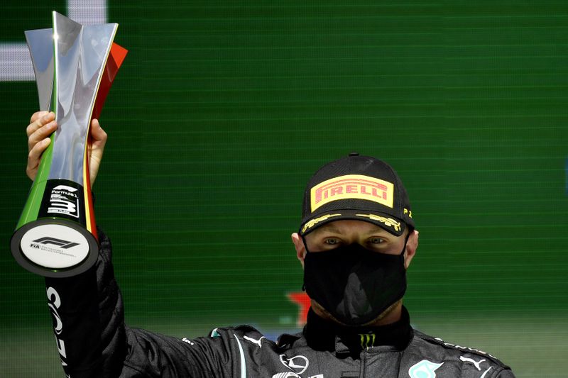 &copy; Reuters. بوتاس سائق مرسيدس يحتفل بفوزه بالمركز الثالث في سباق جائزة البرتغال الكبرى في فورمولا 1 يوم الثاني من مايو ايار 2021. صورة من ممثل لوكالات الأن