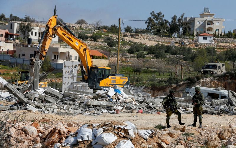 &copy; Reuters. A Bani Naim en Cisjordanie.  Des puissances européennes demandent à Israël de stopper la construction de nouveaux logements dans de nouveaux territoires occupés en Cisjordanie. /Photo prise le 8 mars 2021/REUTERS/Mussa Qawasma