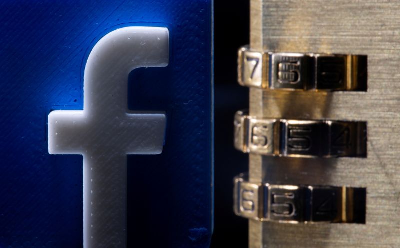 &copy; Reuters. FILE PHOTO: A 3D printed Facebook logo is seen behind a padlock