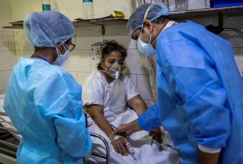 &copy; Reuters. The Wider Image: As COVID ravages India, a 26-year-old doctor decides who lives and who dies