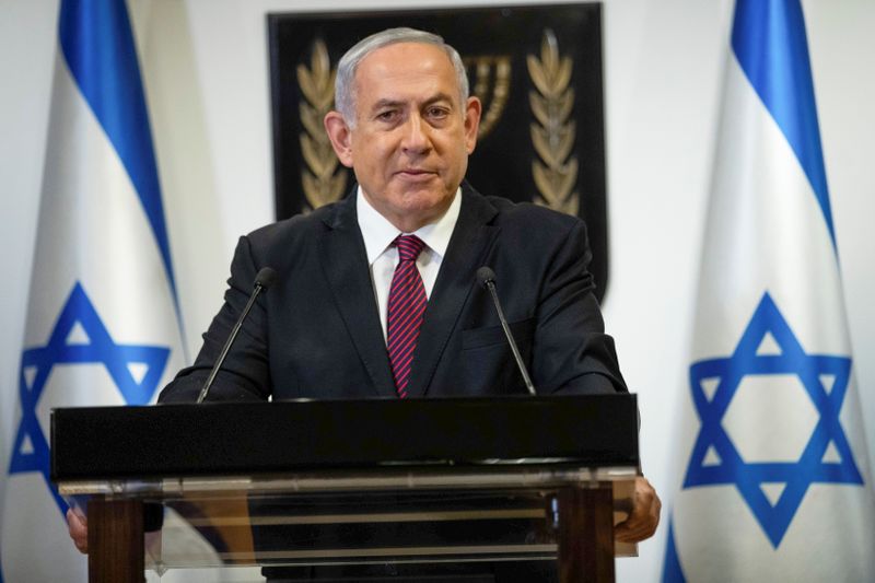 &copy; Reuters. FILE PHOTO: Israeli Prime Minister Benjamin Netanyahu delivers a statement at the Knesset (Israel's parliament) in Jerusalem, December 22, 2020. Yonatan Sindel/Pool via REUTERS
