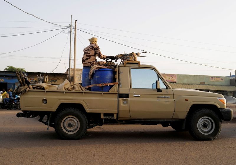 &copy; Reuters. FILE PHOTO: Members of the security forces patrol Chad's capital N'Djamena following the battlefield death of President Idriss Deby in N'Djamena, Chad April 26, 2021. REUTERS/Zohra Bensemra/File Photo