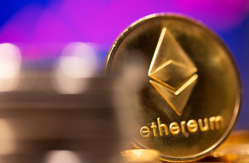 &copy; Reuters. FILE PHOTO: A representation of virtual currency Ethereum is seen in front of a stock graph in this illustration taken February 19, 2021. REUTERS/Dado Ruvic/Illustration