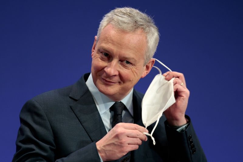 &copy; Reuters. FILE PHOTO: French Economy and Finance Minister Bruno Le Maire removes his protective face mask as he arrives to attend a news conference for the launching of the 2020 income tax campaign at the Bercy Finance Ministry in Paris, France, April 8, 2021. REUT