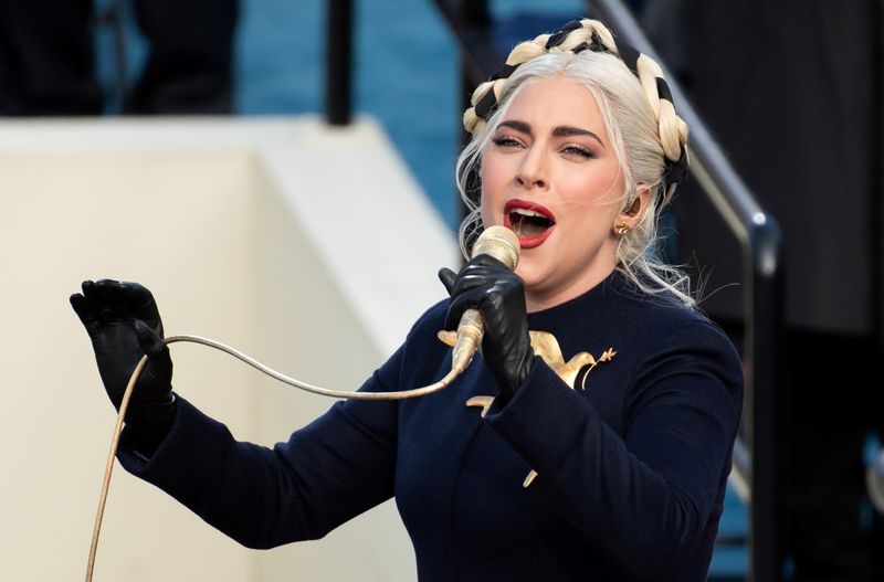 &copy; Reuters. FILE PHOTO: Lady Gaga sings the US National Anthem during the 59th Presidential Inauguration at in Washington, U.S., January 20, 2021.  Saul Loeb/Pool via REUTERS/File Photo