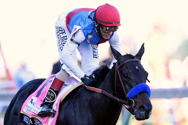 &copy; Reuters. FILE PHOTO: May 1, 2021; Louisville, Kentucky, USA; John Velazquez guides Medina Spirit to win the 147th running of the Kentucky Derby at Churchill Downs. / Jamie Rhodes-USA TODAY Sports/File Photo