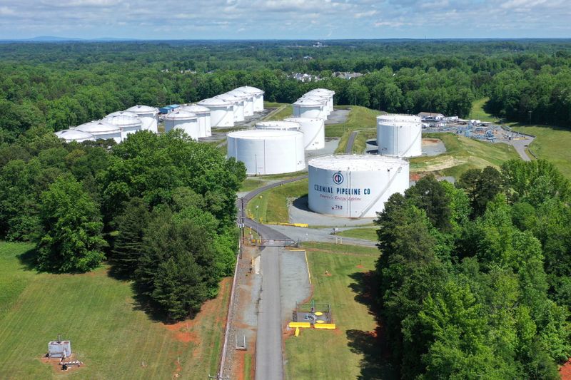 &copy; Reuters. FILE PHOTO: Holding tanks are seen in an aerial photograph at Colonial Pipeline's Charlotte Tank Farm in Charlotte, North Carolina, U.S. May 10, 2021. REUTERS/Drone Base