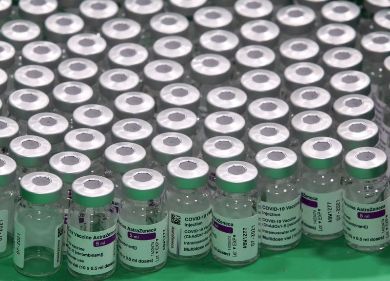 &copy; Reuters. FILE PHOTO: Empty vials of Oxford/AstraZeneca's COVID-19 vaccine are seen at a vaccination centre in Antwerp, Belgium March 18, 2021. REUTERS/Yves Herman/File Photo